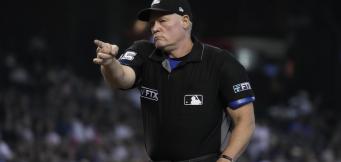 how much do MLB umpires earn