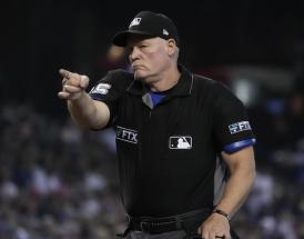 how much do MLB umpires earn